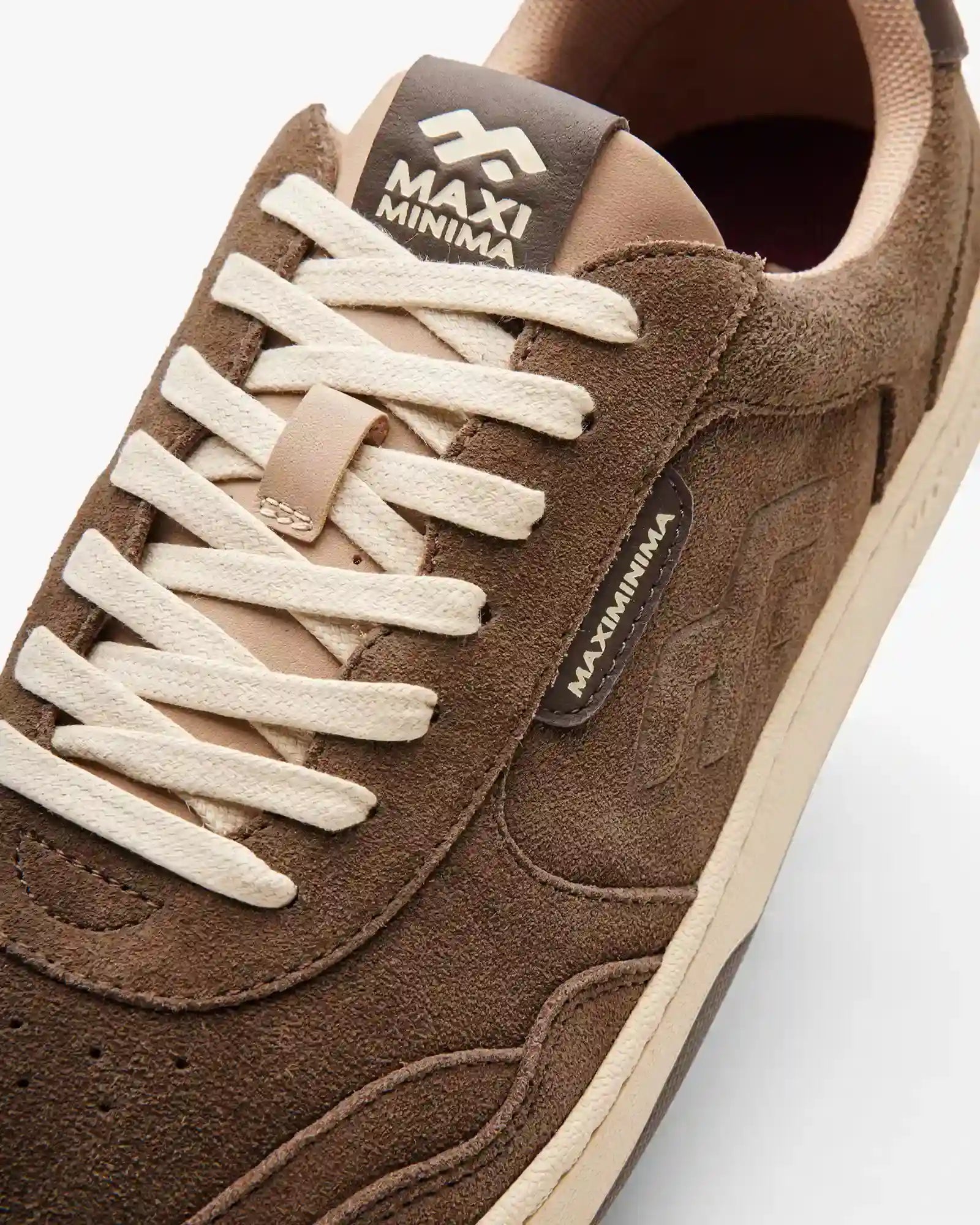Maximinima Axis brown barefoot sneaker close-up showing upper material, laces and branding detail