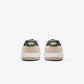 Maximinima Axis off-white and green barefoot sneaker rear heel view showing minimalist construction and natural shape