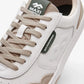 Maximinima Axis off-white and green barefoot sneaker close-up showing upper material, laces and branding detail