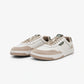 Maximinima Axis off-white and green barefoot sneakers angled pair view showing natural foot shape and minimalist design