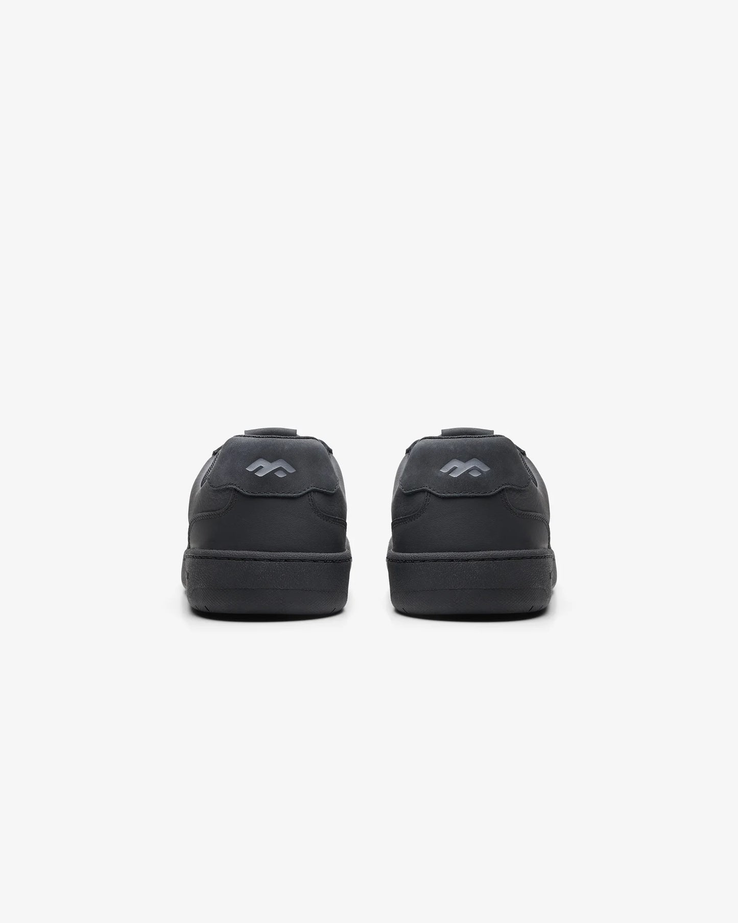 Maximinima Axis black barefoot sneaker rear heel view showing minimalist construction and natural shape