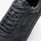 Maximinima Axis black barefoot sneaker close-up showing upper material, laces and branding detail