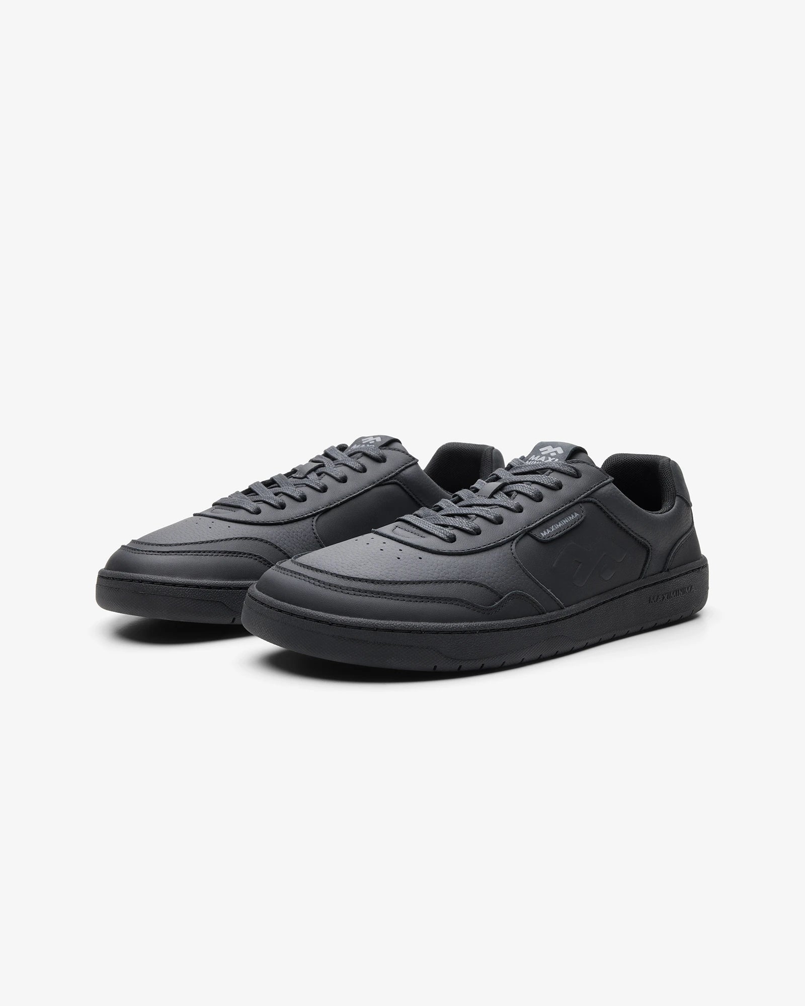 Maximinima Axis black barefoot sneakers angled pair view showing natural foot shape and minimalist design